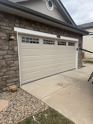 NEW STEEL BACK INSULATED DOOR WITH STOCKTON WINDOWS - For this install, the homeowner needed a new garage door that met HOA guidelines and closely matched the look of the original. We installed a modern, insulated door that blended seamlessly with the home’s existing style, keeping the HOA happy while giving the home an updated appearance. The client was especially thrilled with how quiet the new door is compared to the original 40-year-old wood door, which had become loud and worn over time. NEW STEEL BACK INSULATED DOOR WITH STOCKTON WINDOWS - For this install, the homeowner needed a new garage door that met HOA guidelines and closely matched the look of the original. We installed a modern, insulated door that blended seamlessly with the home’s existing style, keeping the HOA happy while giving the home an updated appearance. The client was especially thrilled with how quiet the new door is compared to the original 40-year-old wood door, which had become loud and worn over time.