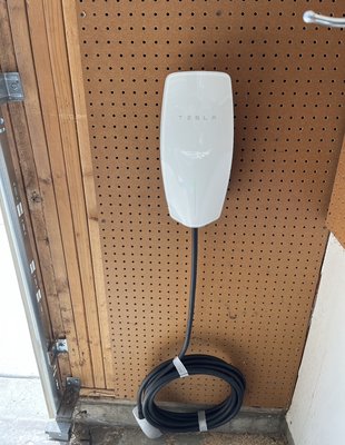 Tesla car charger installation - Customer requested a Tesla car charger installation approximately 75 feet from the electrical panel in their garage! Tesla car charger installation - Customer requested a Tesla car charger installation approximately 75 feet from the electrical panel in their garage!