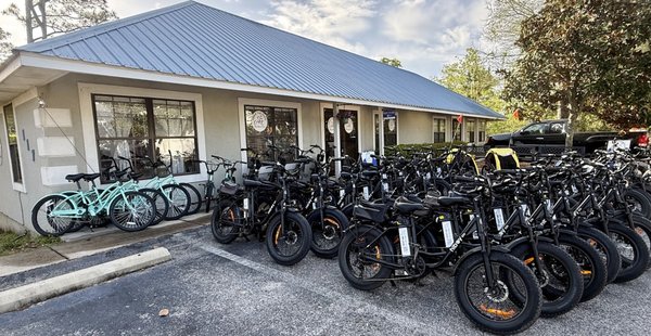 Grand Opening New Location - Come and see why riders are calling us one of the best e-bike rental experiences in Gulf Shores! 
We're now renting fun at 117 E. 14th Ave, located less than 50 feet from the Gulf State Park trail entrance. Skip the traffic and start your adventure immediately on 28 miles of beautiful paved trails. Fun, easy-to-ride e-bikes, e-trikes, and family-friendly options available. Your next outdoor adventure starts here!