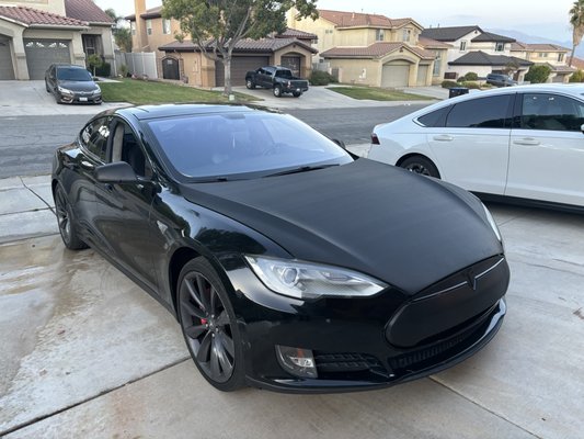 Tesla Model S - Remodeled Tesla Model S with Carbon Fiber hood and with a black chrome delete.
