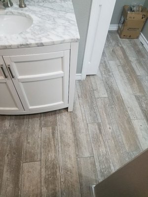 Bathroom Remodel - The old bathroom used to have tile in all walls and flooring and shower area used to be smaller demo all walls as well as old shower frame a