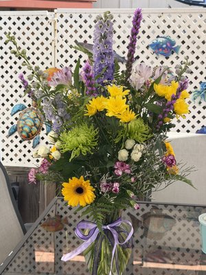 Birthday Bouqurts - My Flower designs are based on what the client wants and describes to me.  I really enjoy watching the faces when delivered.