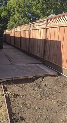 Fence - Fence 70 ft long by 7 ft high including 1 ft standard lattice Fence - Fence 70 ft long by 7 ft high including 1 ft standard lattice