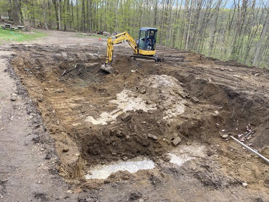 In-ground pool installation - In ground pool installation built the same way as a traditionally poured-concrete foundation for a garage or residential home.