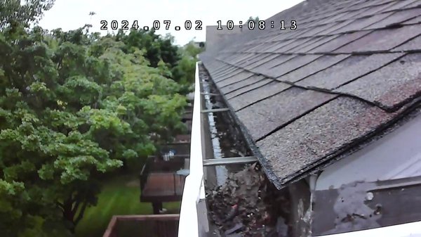 3 Story Clogged Downspout - 3 story clogged downspout cleaned with specialty vacuum operated from the ground. 3 Story Clogged Downspout - 3 story clogged downspout cleaned with specialty vacuum operated from the ground.