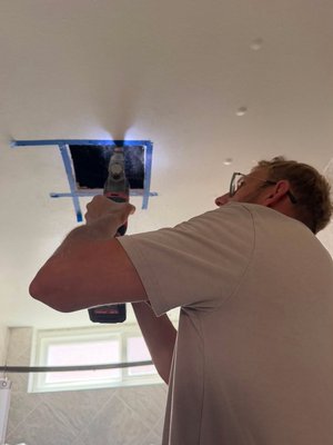 Bathroom Exhaust Fan Installation - A little ceiling work, attic detective work, and plenty of precision 🔧 Andrei carefully measured and cut the ceiling opening, identified the existing electrical pathway, and positioned the fan housing with precision. His attention to detail helped ensure a secure installation, proper ventilation, and a clean finish. Bathroom Exhaust Fan Installation - A little ceiling work, attic detective work, and plenty of precision 🔧 Andrei carefully measured and cut the ceiling opening, identified the existing electrical pathway, and positioned the fan housing with precision. His attention to detail helped ensure a secure installation, proper ventilation, and a clean finish.
