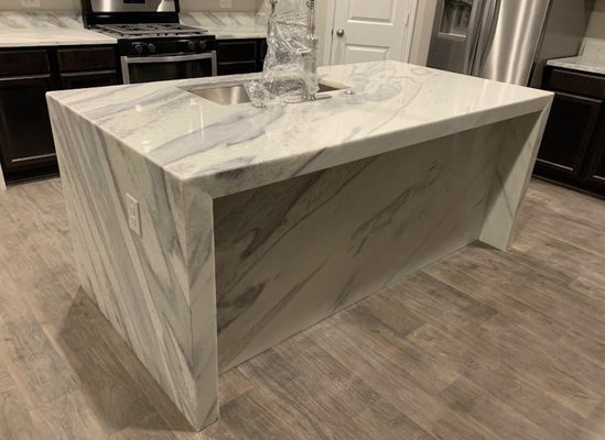 Waterfall Panel Installation’s - Coming into 2024 I’ve seen more and more clients coming in asking for this unique custom preference when it comes to the design of their countertops. Here’s a Selection of a few Waterfall Panel projects to give you a better idea as to what your countertops Waterfall Panel Installation’s - Coming into 2024 I’ve seen more and more clients coming in asking for this unique custom preference when it comes to the design of their countertops. Here’s a Selection of a few Waterfall Panel projects to give you a better idea as to what your countertops