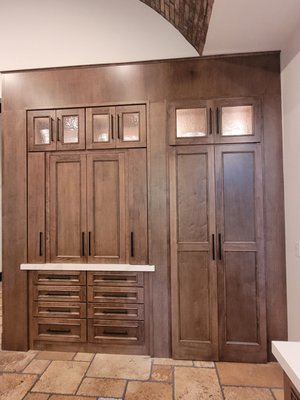 Magnificent Weston Kitchen - We love Weston kitchens. This kitchen has custom design elements maximizing functionality while maintaining a stunning appearance. The coffee station opens completely utilizing pocket doors and automatic lighting. The full walk-in pantry is completely hidden with the doors closed. There is a combination of warm wood and luxurious porcelain countertops. Bathroom vanities at each access hallway match the kitchen. Truly artful. We are happy for the wonderful family that entrusted us to create a design and bring it to life. Magnificent Weston Kitchen - We love Weston kitchens. This kitchen has custom design elements maximizing functionality while maintaining a stunning appearance. The coffee station opens completely utilizing pocket doors and automatic lighting. The full walk-in pantry is completely hidden with the doors closed. There is a combination of warm wood and luxurious porcelain countertops. Bathroom vanities at each access hallway match the kitchen. Truly artful. We are happy for the wonderful family that entrusted us to create a design and bring it to life.