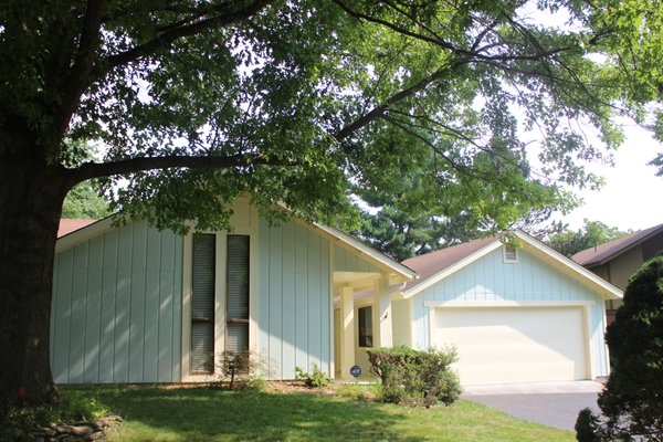 Exterior Painting - This house was last painted in the 1980s. It needed:
-rotting wood repairs
-Power wash mossy/moldy entry way
-Paint cement entry way
-Full exterior painting