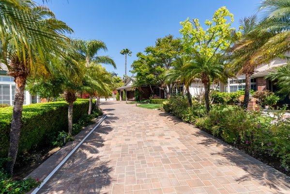 Drive Way By We The People Construction Leading Pavers Builders In Orange, CA - We The People Construction recently completed a beautifully crafted driveway in Orange, CA.
Known for our expertise in paver installation, we transformed this space into a durable and visually appealing driveway using premium interlocking pavers. The client sought a solution that combined functionality with aesthetic appeal, and our team delivered with precision and attention to detail.
The driveway design included a custom layout with a mix of neutral-colored pavers that enhanced the property’s curb appeal. Our installation process ensured proper grading for optimal drainage and longevity, making it not only a visually striking addition but also a practical improvement to the home.
Every element of the project was customized to match the client’s taste, from the paver selection to the decorative border accents that gave the driveway a unique and elegant finish. Whether you’re looking for a driveway that stands out or one that seamlessly integrates into your home’s design, We The People Construction is the paver expert you can trust for quality and style.
Contact us today to learn how we can enhance your outdoor space with our expert driveway solutions! Drive Way By We The People Construction Leading Pavers Builders In Orange, CA - We The People Construction recently completed a beautifully crafted driveway in Orange, CA.
Known for our expertise in paver installation, we transformed this space into a durable and visually appealing driveway using premium interlocking pavers. The client sought a solution that combined functionality with aesthetic appeal, and our team delivered with precision and attention to detail.
The driveway design included a custom layout with a mix of neutral-colored pavers that enhanced the property’s curb appeal. Our installation process ensured proper grading for optimal drainage and longevity, making it not only a visually striking addition but also a practical improvement to the home.
Every element of the project was customized to match the client’s taste, from the paver selection to the decorative border accents that gave the driveway a unique and elegant finish. Whether you’re looking for a driveway that stands out or one that seamlessly integrates into your home’s design, We The People Construction is the paver expert you can trust for quality and style.
Contact us today to learn how we can enhance your outdoor space with our expert driveway solutions!
