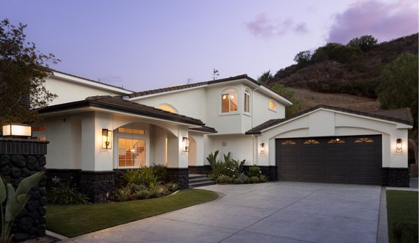 Exterior and Landscape Makeover - The exterior and landscape were carefully redesigned to complement the home’s architecture and elevate its overall curb appeal. Our team focused on clean lines, balanced proportions, and a cohesive material palette to create a welcoming and polished first impression.

The landscape design was thoughtfully planned to enhance the property while remaining low-maintenance and functional. Strategic planting, hardscape elements, and outdoor detailing were integrated to frame the home beautifully and create a seamless connection between the exterior and interior spaces. The result is a refined, inviting outdoor environment that completes the transformation of the property.