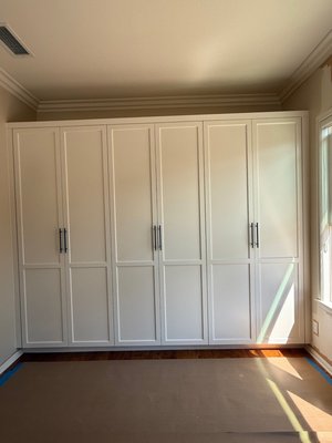Closet Wardrobe-Custom Paint - A wall to wall wardrobe with Shaker doors in a custom painted finish