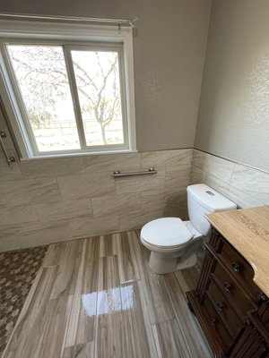 Bathroom remodel with walk in shower - This remodel was done for a customer that was in a wheelchair. Bathroom remodel with walk in shower - This remodel was done for a customer that was in a wheelchair.