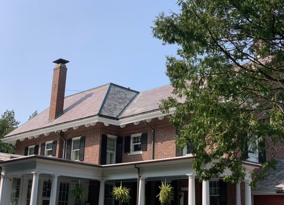 Slate roof - This beautiful house deserved a beautiful slate roof with aluminum edging. Slate roof - This beautiful house deserved a beautiful slate roof with aluminum edging.
