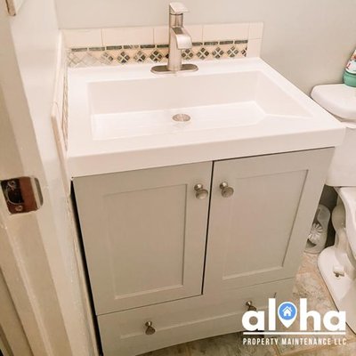 Bathroom Vanity Installation - We upgraded this outdated bathroom vanity for this customer.