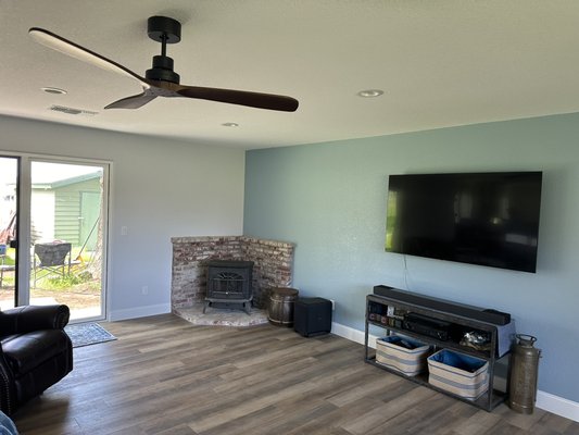 Interior project - Kitchen and living room - This customer converted his attached garage into his living room and did a complete remodel of his kitchen. We painted his ceilings (flat white), his walls light gray with some blue tones (eggshell), 1 accent wall light blue (eggshell), white baseboards (semi-gloss) and a navy blue accent kitchen island (semi-gloss). Interior project - Kitchen and living room - This customer converted his attached garage into his living room and did a complete remodel of his kitchen. We painted his ceilings (flat white), his walls light gray with some blue tones (eggshell), 1 accent wall light blue (eggshell), white baseboards (semi-gloss) and a navy blue accent kitchen island (semi-gloss).