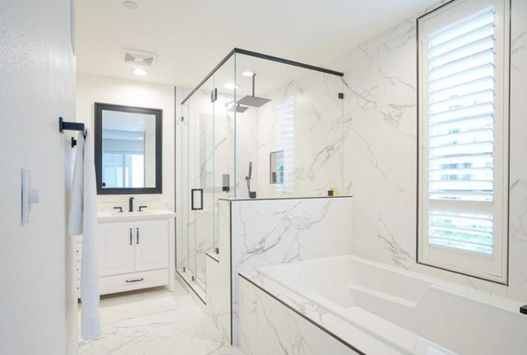Bathroom renovation - "The owner wanted to update and old bathroom after recently purchasing the house. Old shower stall and bathtub was removed along with the sink and vanity and replaced with new items. Marble tile and new shower stall along with Marble Tile tub Surround opens up the area visually. Adding black outline around the edges of the bathroom, gives it a more modern and a sleek look, which the owner was ultimately aiming for. The project took 4-5 weeks to complete." Bathroom renovation - "The owner wanted to update and old bathroom after recently purchasing the house. Old shower stall and bathtub was removed along with the sink and vanity and replaced with new items. Marble tile and new shower stall along with Marble Tile tub Surround opens up the area visually. Adding black outline around the edges of the bathroom, gives it a more modern and a sleek look, which the owner was ultimately aiming for. The project took 4-5 weeks to complete."