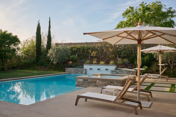 La Costa Home - This La Costa home was a front, side and back yard complete renovation. We absolutely love adore this French chateau architecture meets contemporary pool design. We provided a mediterranean plant palette, hardscape, pool design and an amazing cascading water features. Thank you @Samanthagohphoto for the beautiful pictures.