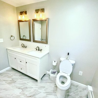 Bathroom Remodel - We updated and installed a new bathtub, tile, sink, vanity, toilet, closet, flooring and even window. We completely gutted it, painted it and made this a beautiful bathroom. Bathroom Remodel - We updated and installed a new bathtub, tile, sink, vanity, toilet, closet, flooring and even window. We completely gutted it, painted it and made this a beautiful bathroom.