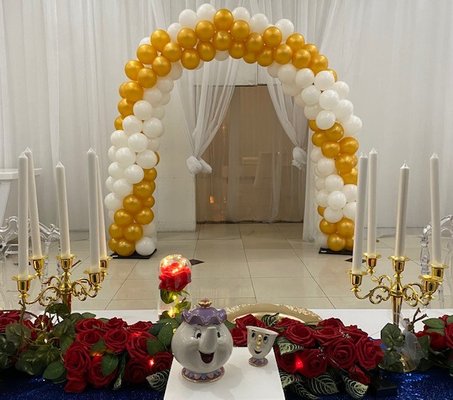 Beauty & The Beast Grand Entrance Balloon Arch - Quinceañeras are so special and grand.  Having guests enter through a beautiful balloon arch sets the mood and makes the guests feel so special. Lights Camera Selfies can create balloon arches and columns to set by the doors or anywhere in the room!  We create balloon decor for all different types of events including balloon centerpieces, garlands, party poles, stages and floating pool displays.