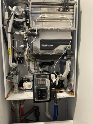 Navien replacement - This is a replacement on a water heater that was leaking..the water heater was a wall hung navien Navien replacement - This is a replacement on a water heater that was leaking..the water heater was a wall hung navien