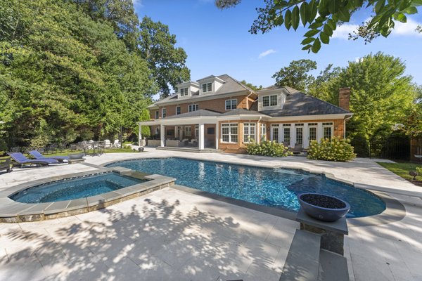Falls Church Renovation - This renovation was extensive. Added a spa with waterfalls, complete new marble pool deck, extended the outdoor covered space to include a full kitchen with Pizza Oven, automatic blinds, and so much more. The addition of a large Sport Court finished out this backyard perfectly. Falls Church Renovation - This renovation was extensive. Added a spa with waterfalls, complete new marble pool deck, extended the outdoor covered space to include a full kitchen with Pizza Oven, automatic blinds, and so much more. The addition of a large Sport Court finished out this backyard perfectly.
