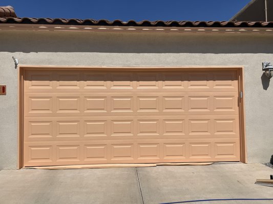 Garage Painting - This client wanted to change their garage color and we did so with quality and care. Here's a before and after:
