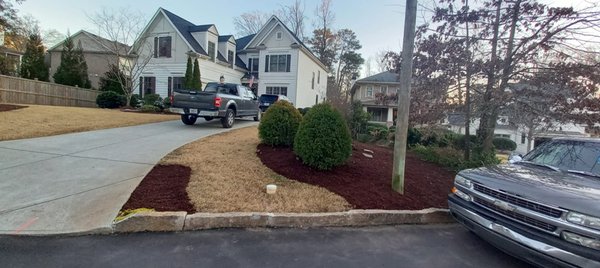 Brookhaven Residential Mulch Refresh - This mulch refresh was completed for a family looking to get their home ready to sell on the market! We were able to provide them with a full mulch bed overhaul for each bed on the property. This included removal of all leaves and weeds from all beds. Prior to us installing the mulch, we treated each location with an environmentally friendly weed inhibitor, as well as installed landscaping fabric under the mulch to prevent future weeds from invading the mulch beds. Brookhaven Residential Mulch Refresh - This mulch refresh was completed for a family looking to get their home ready to sell on the market! We were able to provide them with a full mulch bed overhaul for each bed on the property. This included removal of all leaves and weeds from all beds. Prior to us installing the mulch, we treated each location with an environmentally friendly weed inhibitor, as well as installed landscaping fabric under the mulch to prevent future weeds from invading the mulch beds.