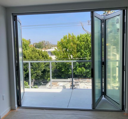 Santa Monica Folding Door - Sure...the phone pole isn't pretty, but this door definitely is! Stylish and functional, this door allows you to truly experience indoor/outdoor living like only California can offer! Santa Monica Folding Door - Sure...the phone pole isn't pretty, but this door definitely is! Stylish and functional, this door allows you to truly experience indoor/outdoor living like only California can offer!
