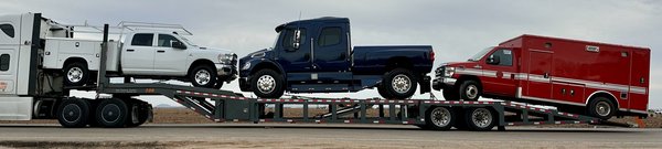 Transporting  Commercial Trucks, Heavy Duty Trucks - We specialize in standard truck transport, commercial truck shipping, and heavy duty truck hauling. Truck transport services are reliable, efficient, and quality.
Truck transport is hauling your truck from one location to another, usually on a semi-truck. However, there are other methods for truck transport and heavy duty truck shipping, such as hot shot trucking.