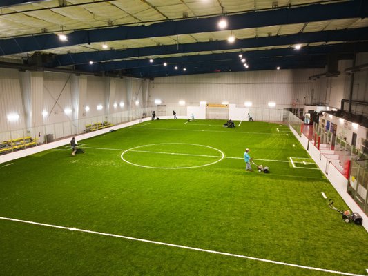 Las Vegas Sports Park Indoor Soccer Field - Our crews knocked this installation out of the park! After installing a foam padding we continued to install our sports turf. This turf requires tons of rubber infill to pass special fall ratings. However, those tons added up to a whopping 60,000 tons! That's the same weight as a humpback whale and all of this has to be professionally power broomed in. We couldn't be happier with the results and all the hard work everyone put in. This project was completed within 2 and a half weeks. Las Vegas Sports Park Indoor Soccer Field - Our crews knocked this installation out of the park! After installing a foam padding we continued to install our sports turf. This turf requires tons of rubber infill to pass special fall ratings. However, those tons added up to a whopping 60,000 tons! That's the same weight as a humpback whale and all of this has to be professionally power broomed in. We couldn't be happier with the results and all the hard work everyone put in. This project was completed within 2 and a half weeks.