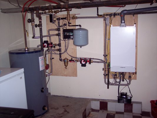 Boilers for Central Heating - We supply & Install High Efficiency Wall Mounted Boilers that provide central heating in homes with all types of Radiators.  These units also produce hot water when connected to an Indirect Water heater.