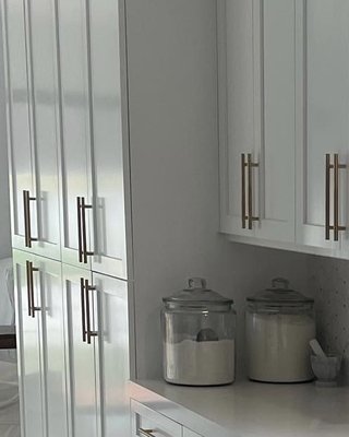 Newly finished Kitchen cabinet project - These were new cabinets (maple/MDF). They were primed with 2 coats of KA surfacer and top coated with a fine finish spray application of Kem Aqua Plus!
