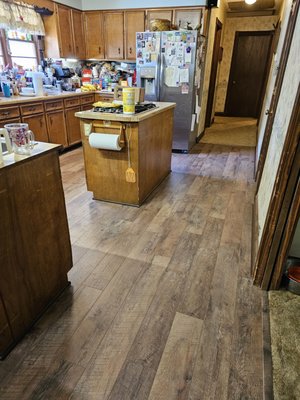kitchen lvp - Flooring replacement.  We removed the old linoleum and replaced it with a beautiful and durable lvp floor.
