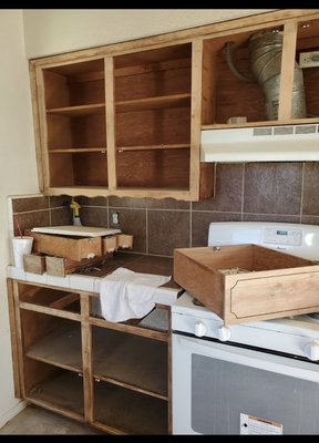 Cabinet Painting - The customer had called us saying she wanted to do something with her cabinets that she was tired of the old brown look & wanted them painted. Cabinet Painting - The customer had called us saying she wanted to do something with her cabinets that she was tired of the old brown look & wanted them painted.
