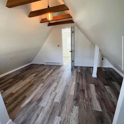 Full Renovation - This 900 sq ft space was in rough shape. It was a two-story garage, we converted to a complete living space with a kitchen, bathroom, upstairs open concept loft with faux beams, everything brand new.