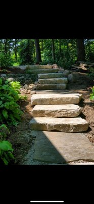 Flagstone stairway - This was another unique project as there was a lot of heavy lifting. But through all the hard work and sweat, it pays off with a beautiful structure like this! Flagstone stairway - This was another unique project as there was a lot of heavy lifting. But through all the hard work and sweat, it pays off with a beautiful structure like this!