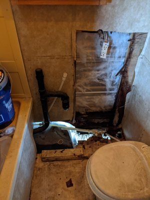 RV bathroom remodel - This is a bathroom that I remodeled after the customer had a tire blowout and cause significant damage. I demolished the cabinets, removed the toilet, the old pex plumbing, and electrical. Next I repaired all the structural damage to the RV, repaired the plumbing and electrical and then sealed everything with foam. Next I custom built the cabinets, and put everything back together. RV bathroom remodel - This is a bathroom that I remodeled after the customer had a tire blowout and cause significant damage. I demolished the cabinets, removed the toilet, the old pex plumbing, and electrical. Next I repaired all the structural damage to the RV, repaired the plumbing and electrical and then sealed everything with foam. Next I custom built the cabinets, and put everything back together.