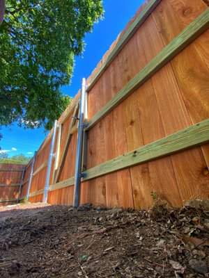 Nail Up Fences in Austin - Privacy Fence For Your YardThe classic “nail up” fence is simple and sturdy. This fence normally consists of non-overlapping, side-by-side boards, but board-on-board styles are also possible. Typically, this style will use “dog-eared” boards or regular flat top boards. It’s a great way to add privacy to your yard, and this style will typically be more affordable than others.
