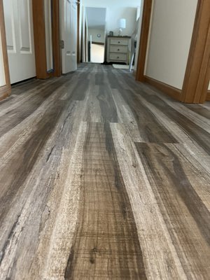Condominium replaced carpet with vinyl plank - Customer was moving in but couldn’t walk through the unit due to them using a walker and having carpet through the condo. They gave us a call and we were happy to help remove the old carpet and replace it with vinyl plank. Take a look at the results for your self.