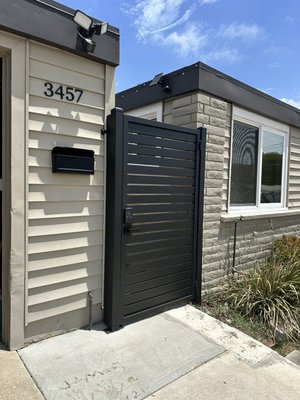 New custum front entrance gate - Custom Modern Metal Gate Installation
Another beautiful project completed! We designed and fabricated this custom horizontal metal gate to give our client the perfect combination of security, privacy, and modern curb appeal.
Custom-built to fit the existing opening
Heavy-duty steel construction
Premium powder-coated finish for long-lasting durability
Modern keypad smart lock for convenient keyless entry Clean, contemporary design that complements the
home's exterior
At ProTex Access Garage Door & Gate Repair, we build every gate to match our customers' style while ensuring years of reliable performance.
Serving San Diego County, including Oceanside, Carlsbad, Vista, San Marcos, Escondido, Encinitas, Solana Beach, Del Mar, and surrounding areas.
Contact us today for a free estimate on your custom gate
project! New custum front entrance gate - Custom Modern Metal Gate Installation
Another beautiful project completed! We designed and fabricated this custom horizontal metal gate to give our client the perfect combination of security, privacy, and modern curb appeal.
Custom-built to fit the existing opening
Heavy-duty steel construction
Premium powder-coated finish for long-lasting durability
Modern keypad smart lock for convenient keyless entry Clean, contemporary design that complements the
home's exterior
At ProTex Access Garage Door & Gate Repair, we build every gate to match our customers' style while ensuring years of reliable performance.
Serving San Diego County, including Oceanside, Carlsbad, Vista, San Marcos, Escondido, Encinitas, Solana Beach, Del Mar, and surrounding areas.
Contact us today for a free estimate on your custom gate
project!