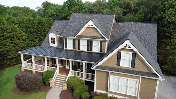 New Roof Replacement - This roof replacement took two days. We only use dump trailers so our client's driveways aren't damaged. They chose the GAF Timberline HDZ shingle in the Appalachian Sky color. We installed GAF ridge vents for proper ventilation. It looks beautiful and the customer was very happy.