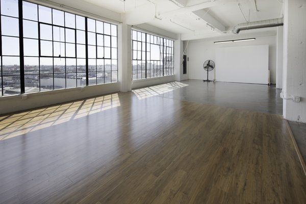 Studio F ($100/hr - 4 hour minimum) - Studio F is our 2100 sq/ft private studio, available for $100/hr (4 hour minimum) 

Event Rates: Starting from $250/hr

Key Features:
-Incredible sunrise light
-8 ft moveable wall
-Wooden floor section 
-Amazing east-facing floor to ceiling windows
-High gloss concrete floors
-Portable makeup station
-Sectional couch
-Speaker
-12 ft ceilings