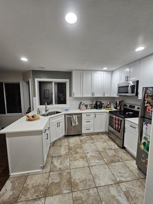 Kitchen/Bath remodel - This was a water damage project where a toilet flood caused significant damage to the kitchen, requiring a full dismantle and remodel. We worked closely with the insurance company to ensure the client received the most from their claim. During the process, we addressed dry rot in the framing and patched the sheetrock. The clients opted for a fresh, modern look with white cabinets, sleek countertops, and a stylish hexagon backsplash. Got water damage? We've got you covered! Call us now to book an estimate for your project! Kitchen/Bath remodel - This was a water damage project where a toilet flood caused significant damage to the kitchen, requiring a full dismantle and remodel. We worked closely with the insurance company to ensure the client received the most from their claim. During the process, we addressed dry rot in the framing and patched the sheetrock. The clients opted for a fresh, modern look with white cabinets, sleek countertops, and a stylish hexagon backsplash. Got water damage? We've got you covered! Call us now to book an estimate for your project!