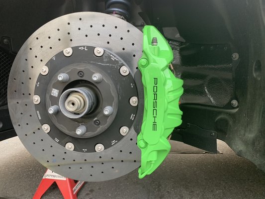 Porsche 911 GT3 RS - Customer wanted the Calipers painted Porsche Lizard Green to match their Weissach Spec GT3RS. Upon removing the wheels some severe damage was revealed on the two front calipers caused by debris logged between the inner barrel of the wheel and the caliper. Easily repaired and repainted! Porsche 911 GT3 RS - Customer wanted the Calipers painted Porsche Lizard Green to match their Weissach Spec GT3RS. Upon removing the wheels some severe damage was revealed on the two front calipers caused by debris logged between the inner barrel of the wheel and the caliper. Easily repaired and repainted!