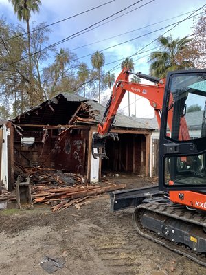 Garage demolition and hauling - I got hired from a general contractor to remove and haul away this 2 car garage including the concrete slab because he is building an ADU. We demolished and hauled away the garage in a day and finished removing the slab the next day.