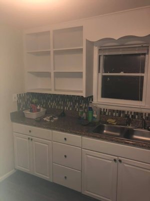 Cabinet Repair & Painting - This project was done during a full residential painting, The cabinets were very worn and we refurbished them and painted.