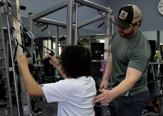 Back day with a young client - This is a young client of mine who is less familiar with strength training. In these photos you can see us working together to help him properly engage his back musculature. Since you can’t see the muscles on your back sometimes people have a hard time engaging it properly. He is already improving his movement patterns so much! Back day with a young client - This is a young client of mine who is less familiar with strength training. In these photos you can see us working together to help him properly engage his back musculature. Since you can’t see the muscles on your back sometimes people have a hard time engaging it properly. He is already improving his movement patterns so much!