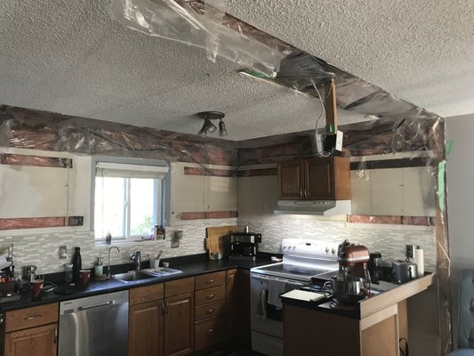 Port Coquitlam Textured Ceiling Removal & Paint - This Old Port Coquitlam Home was doing a large renovation and asked us to patch up any holes they made throughout, then remove the textured ceilings and then paint the ceilings and walls. Here’s a quick look.