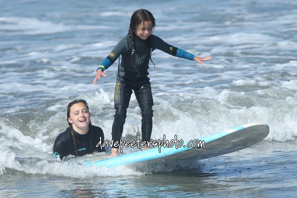 Private & Semi-Private Lessons - Welcome to M & M Surfing School, one of the most celebrated surfing schools in Southern California for over 20 years. It doesn't matter whether you are a beginner, intermediate or an advanced surfer, when you come to M & M Surfing School you have reached your destination. This is where your dreams of surfing will come true and your exciting ocean adventures begin.
People from all walks of life, from ages 5 to adults, from around the world have learned the basic fundamentals of surfing, water safety, and much more. In fact, it is the "much more," that has earned for Michael Pless Sr. the moniker "The Saint of Seal Beach." With even one lesson from M & M Surfing School, students come away with an enhanced appreciation for life and a wider respect for the ocean.
Whether you are a visitor to Southern California or a local from Los Angeles or Orange County, taking a class with M & M Surfing School will get you on the wave in with a positive experience and loads of fun. We invite you to visit our website for more information, then give us a call today! Private & Semi-Private Lessons - Welcome to M & M Surfing School, one of the most celebrated surfing schools in Southern California for over 20 years. It doesn't matter whether you are a beginner, intermediate or an advanced surfer, when you come to M & M Surfing School you have reached your destination. This is where your dreams of surfing will come true and your exciting ocean adventures begin.
People from all walks of life, from ages 5 to adults, from around the world have learned the basic fundamentals of surfing, water safety, and much more. In fact, it is the "much more," that has earned for Michael Pless Sr. the moniker "The Saint of Seal Beach." With even one lesson from M & M Surfing School, students come away with an enhanced appreciation for life and a wider respect for the ocean.
Whether you are a visitor to Southern California or a local from Los Angeles or Orange County, taking a class with M & M Surfing School will get you on the wave in with a positive experience and loads of fun. We invite you to visit our website for more information, then give us a call today!